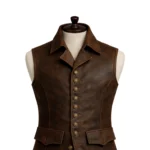 Brown sleeveless pirate-inspired leather vest with lapel collar, button front, flap pockets, stitched panels, and shaped waist