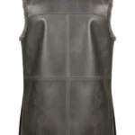 Charcoal gray sleeveless Viking-inspired vest with fur-look collar and arm trim, structured panels, long shape, and toggle-style detailing