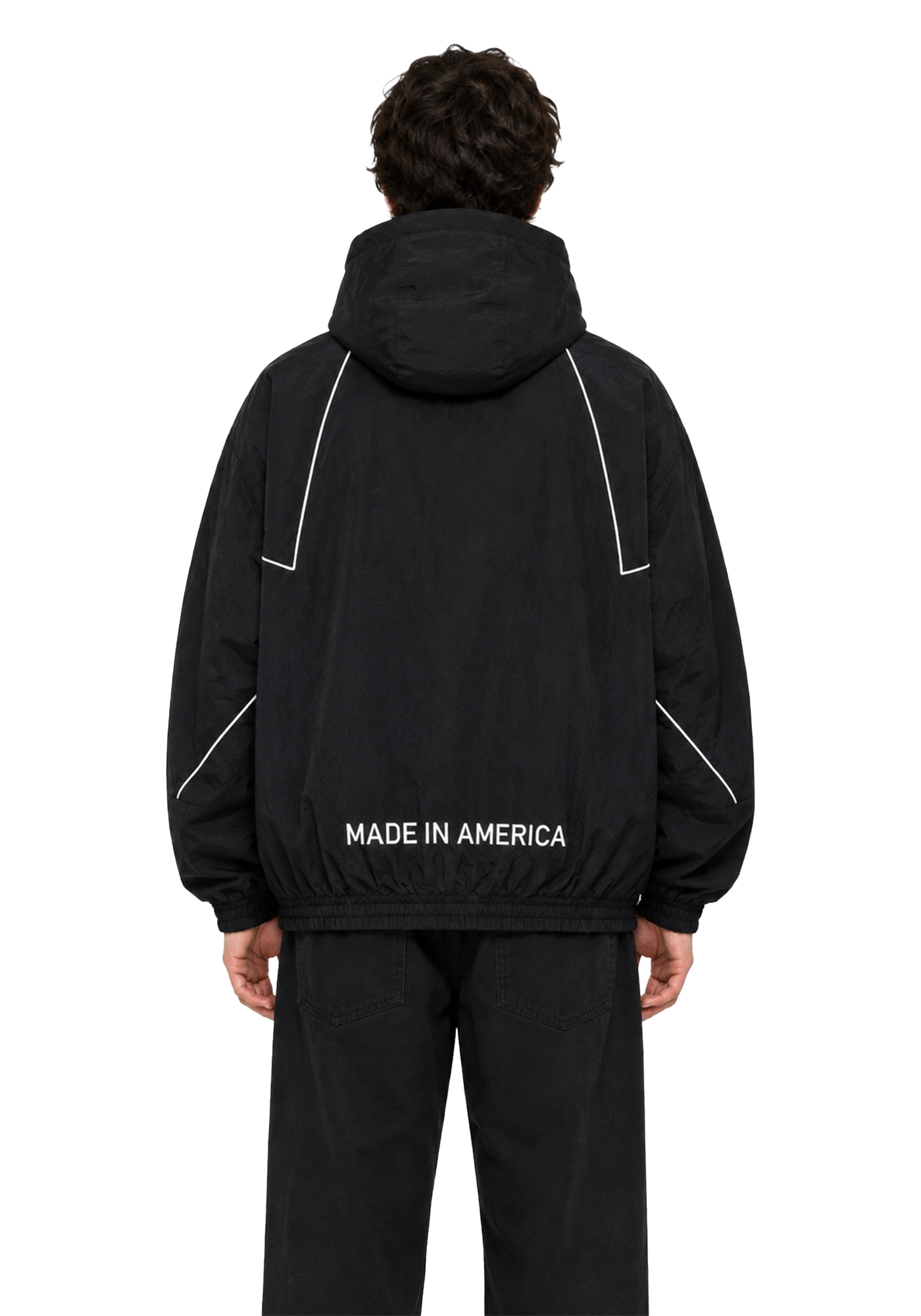 Black Marty Supreme inspired hooded jacket with white piping, orange stars, long sleeves, elastic cuffs, and printed back detail